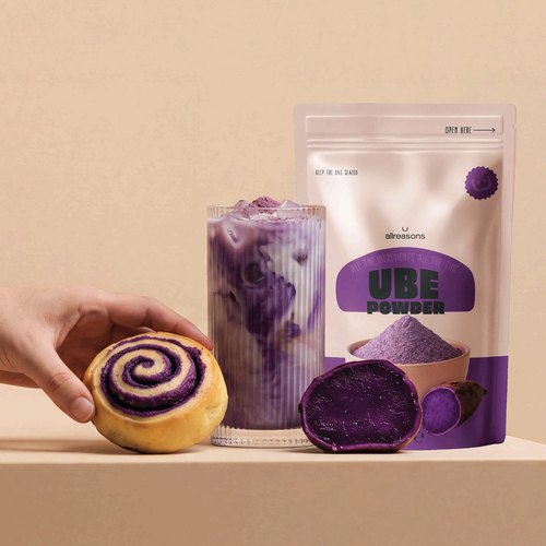 Ube latte and ube bun next to the Allreasons Ube Powder pouch